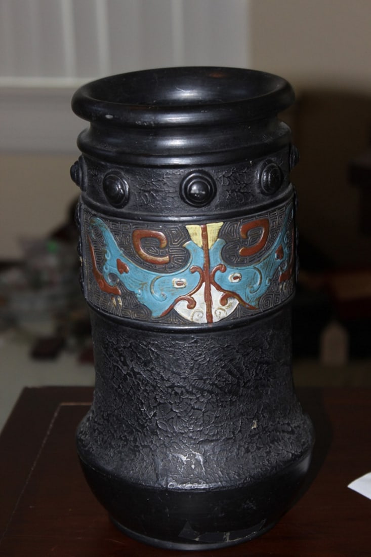 Japanese Black Ceramic Vase: Circa early 20th century. Nice subject. 10" tall.
