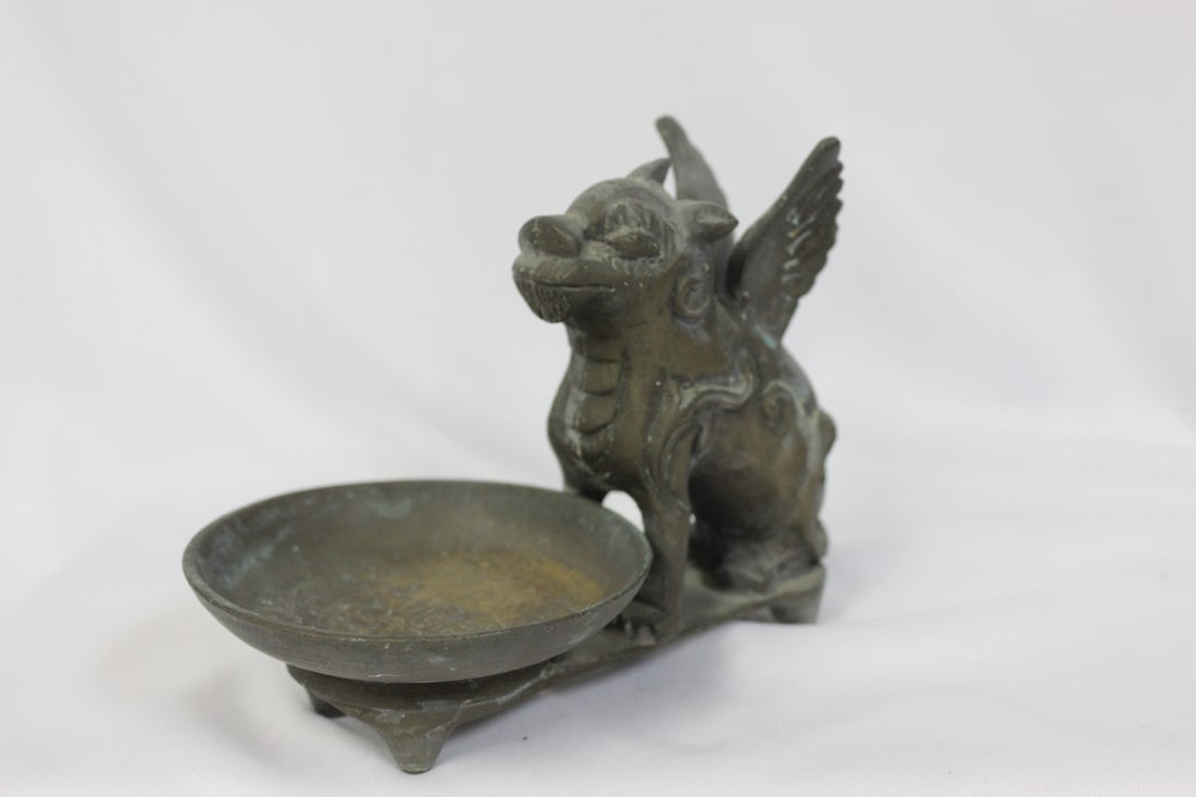 A Brass Beast Dish?: marked "made in china" - 5 inches across