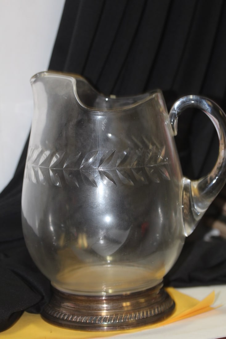 An English Sterling Rim and Cut Glass Pitcher: antique - 9 1/2" tall