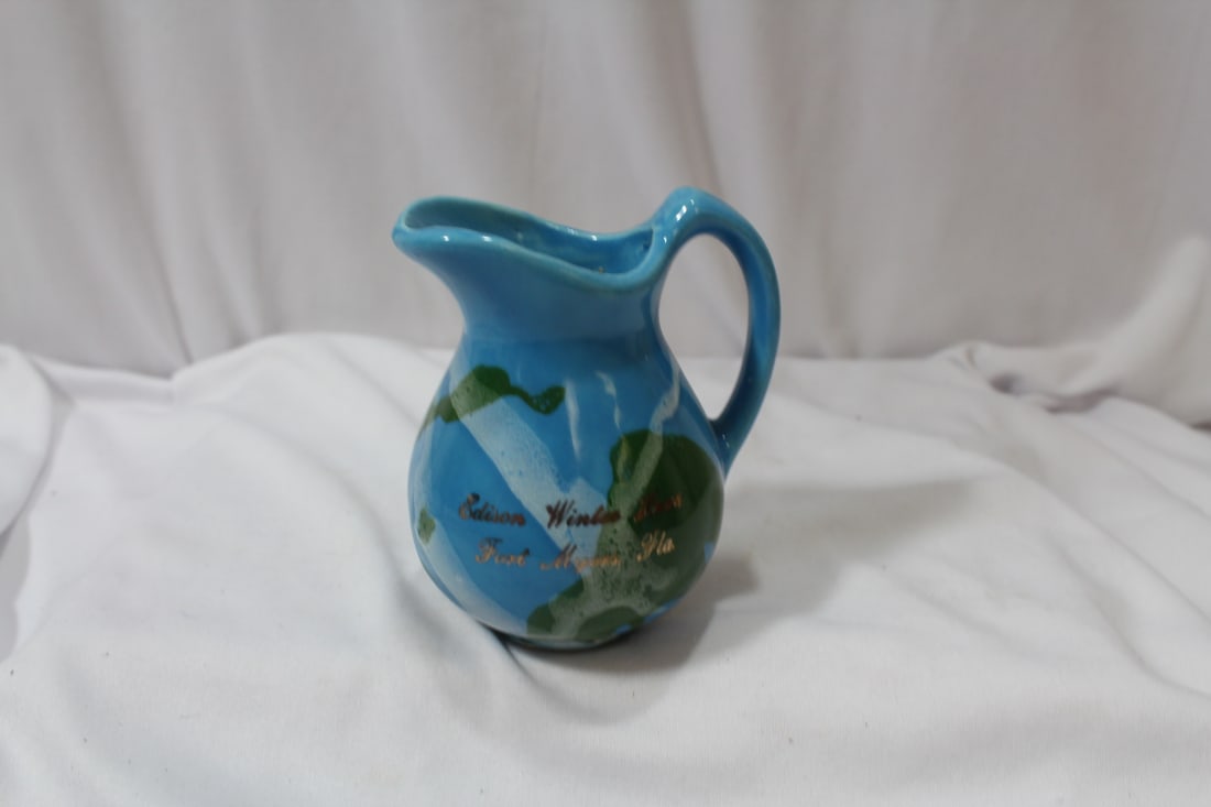 A Pottery Pitcher: 4" tall