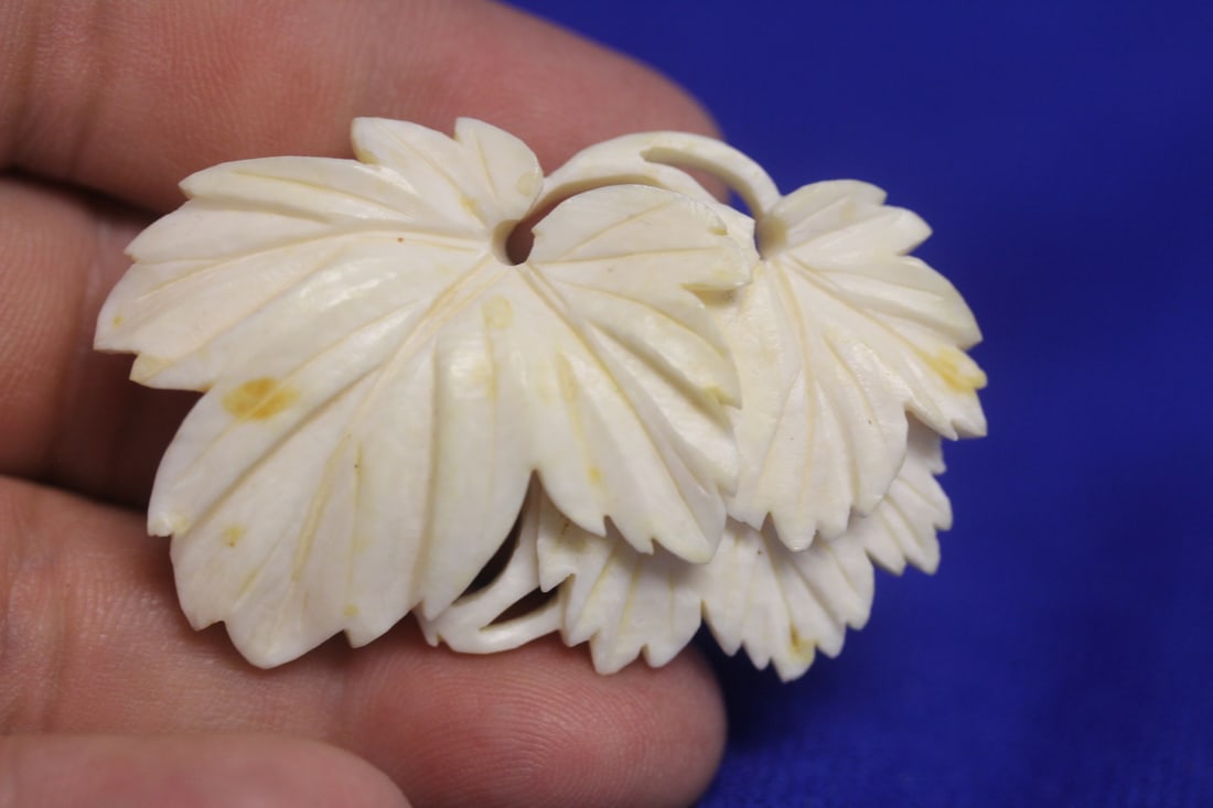 A Carved Bone Brooch or Pin: as shown