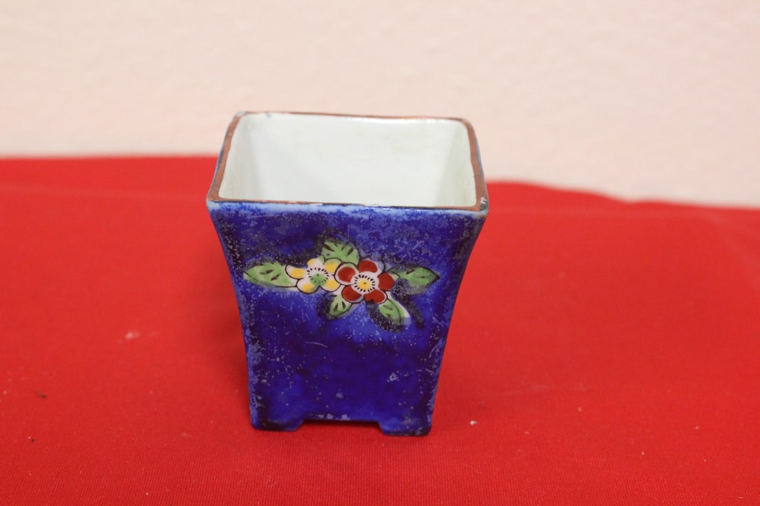 A Japanese Ceramic Container: marked on the bottom - 3" tall