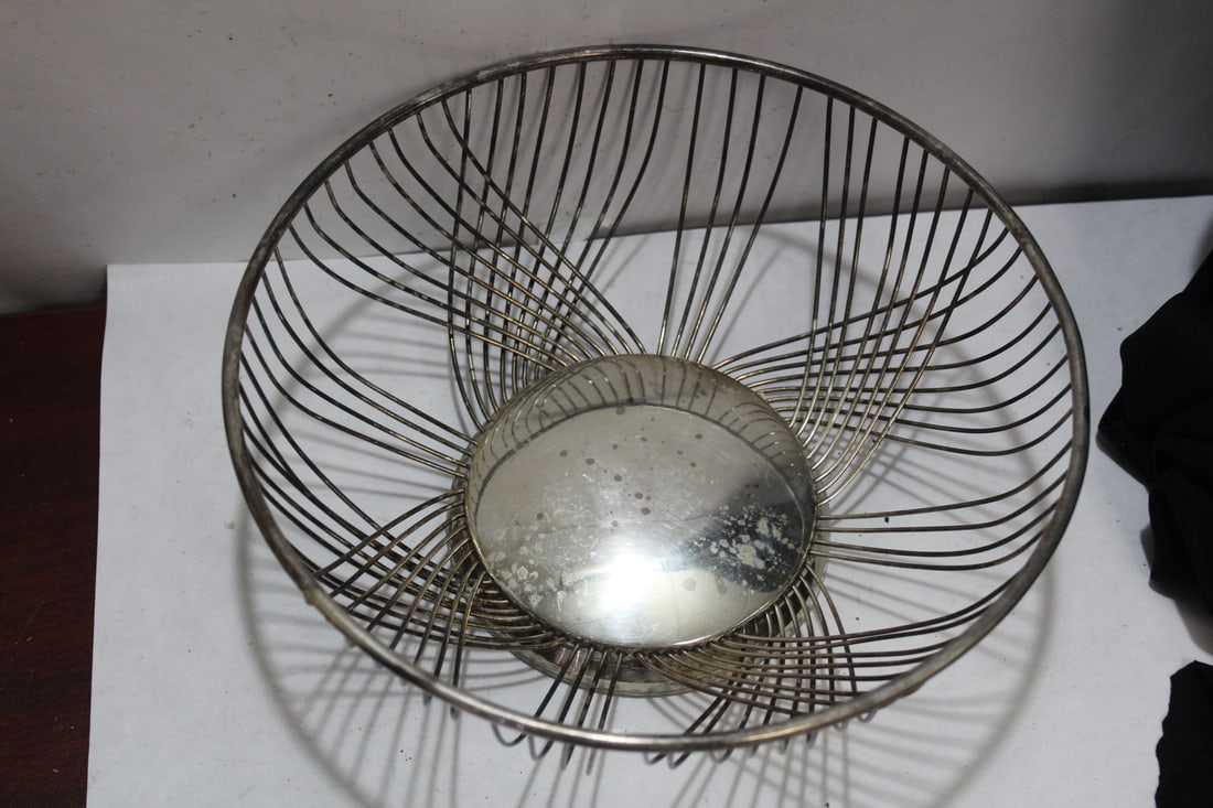 A Silverplated Strainer: 9 3/4" in diameter
