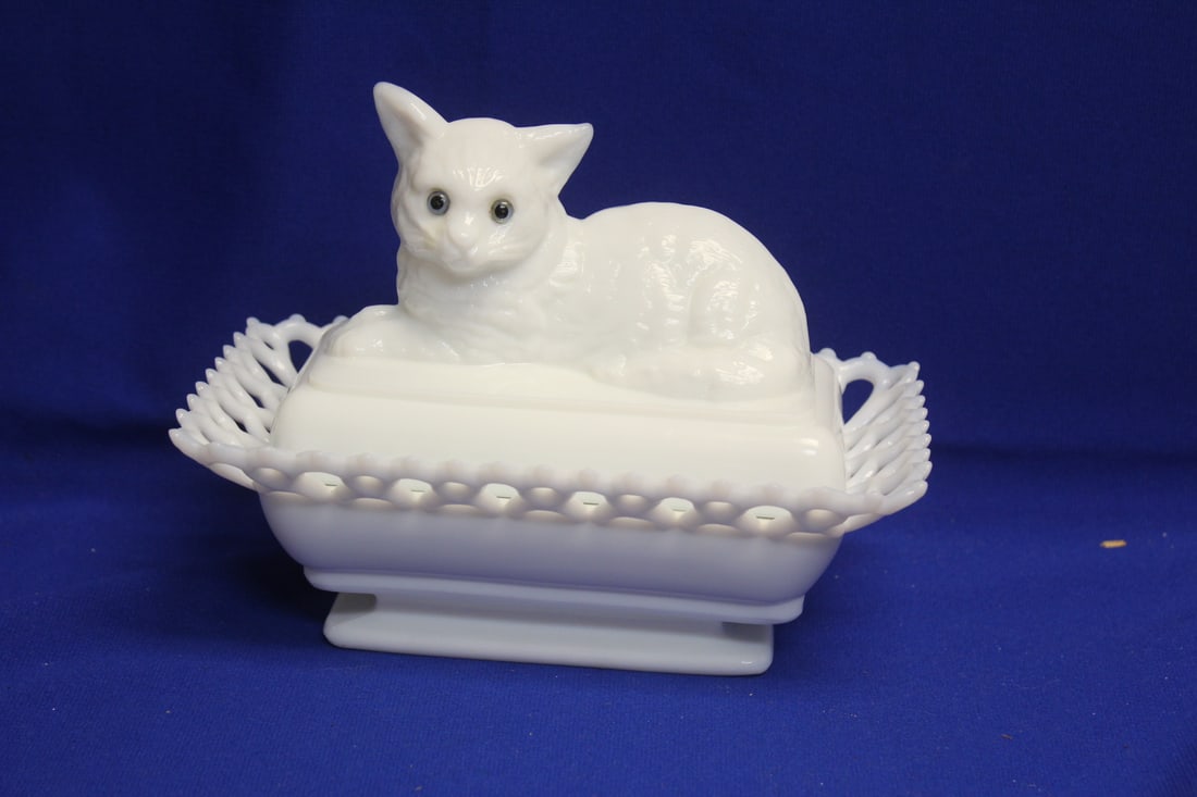 A Westmoreland Milk Glass Candy Dish: cat nesting figure - 8 inches wide