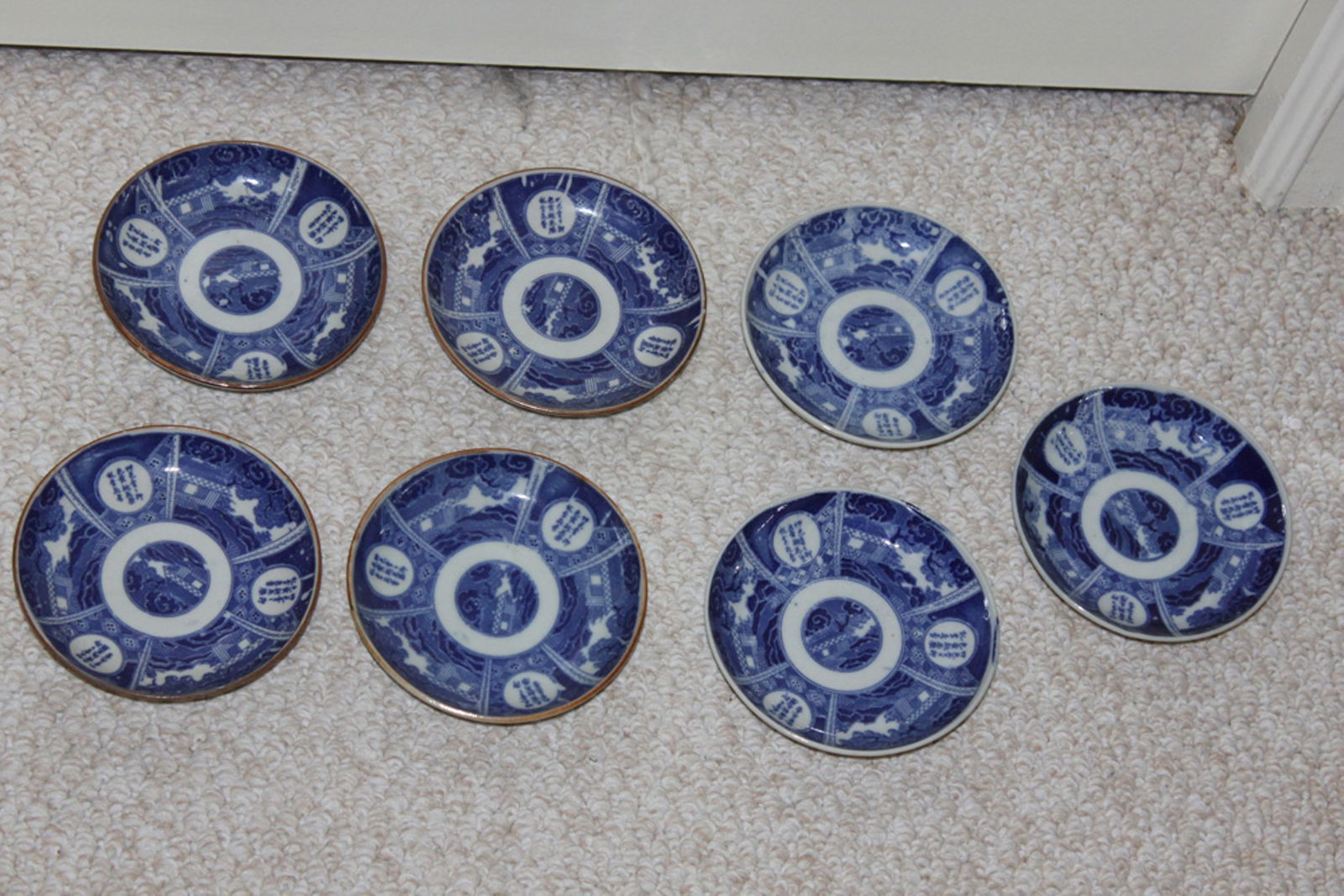 Lot of 7 Japanese Imari Blue and White Small Dish: Circa 19th century. 5" in diameter apiece.