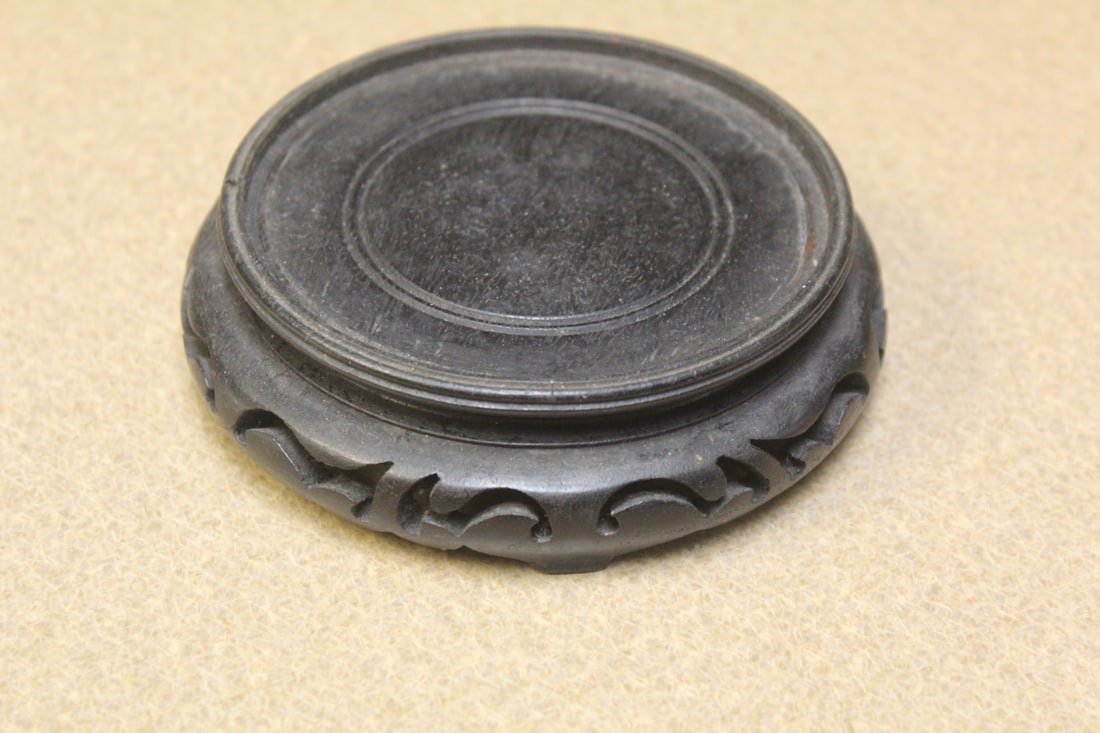 Wooden stand: nicely carved, inside diameter 3 1/2"