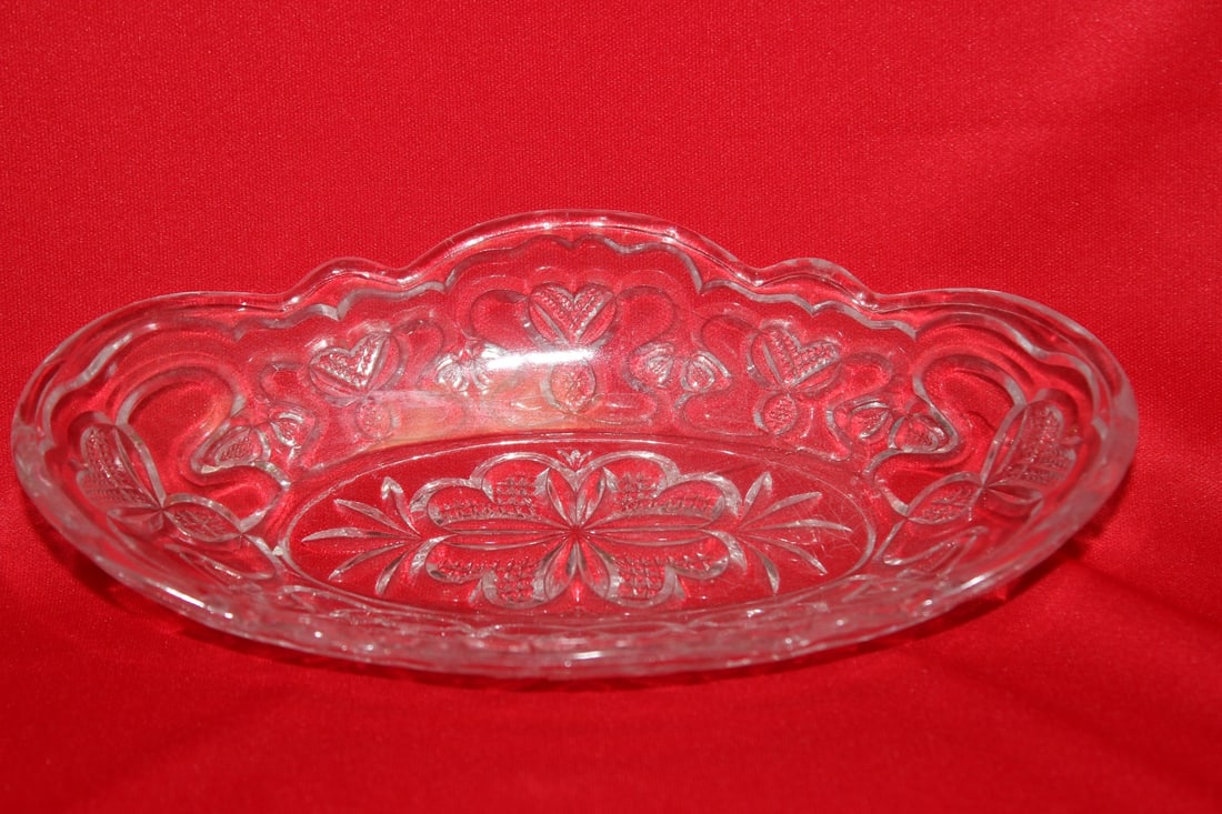 A Pressed Glass Jewelry Dish: 4 1/2" in diameter