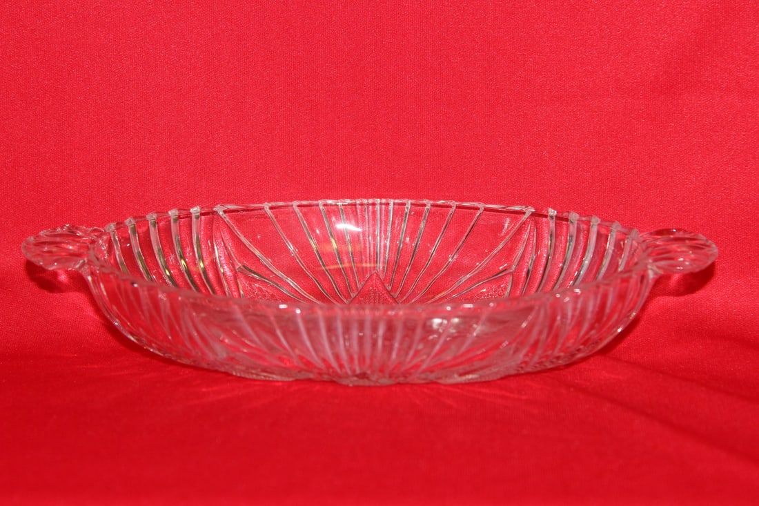 A Pressed Glass Jewelry Dish: 4 1/2" in diameter