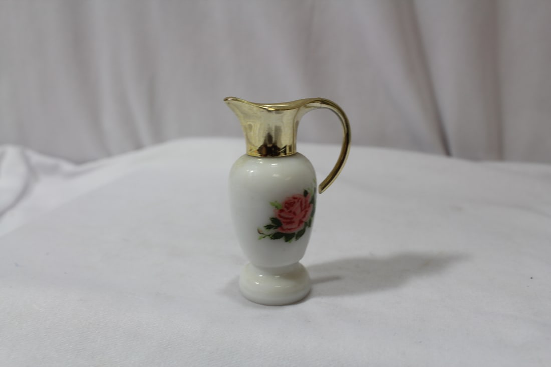 A Perfume Bottle: 2 1/2" tall