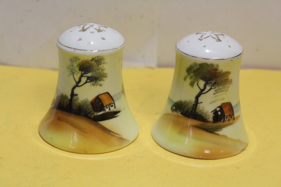 A Pair of Nippon Salt and Pepper Shakers: please note: no stoppers - 3" tall each
