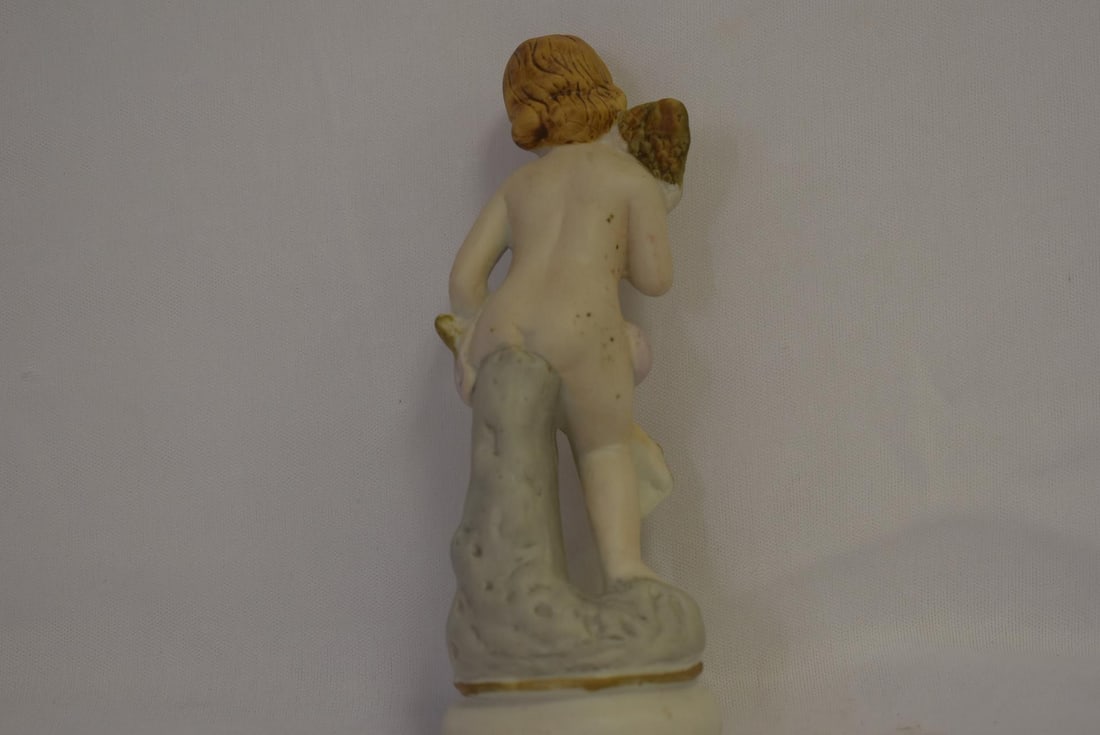 A Bisque Figurine - 3