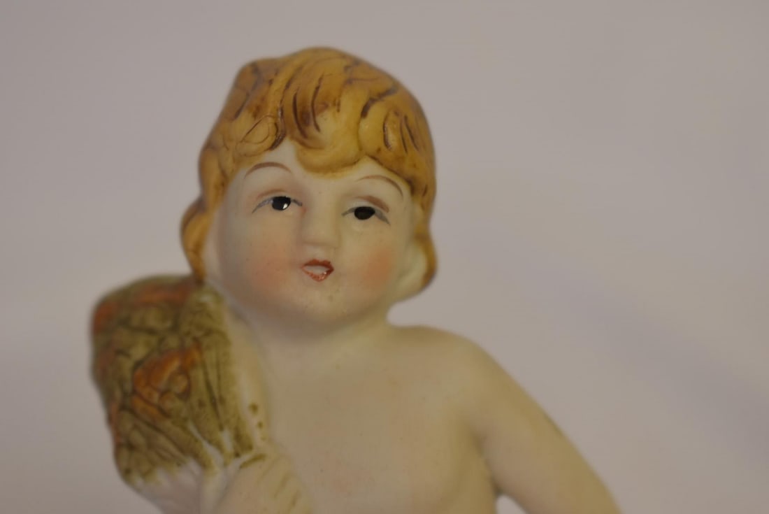 A Bisque Figurine - 5