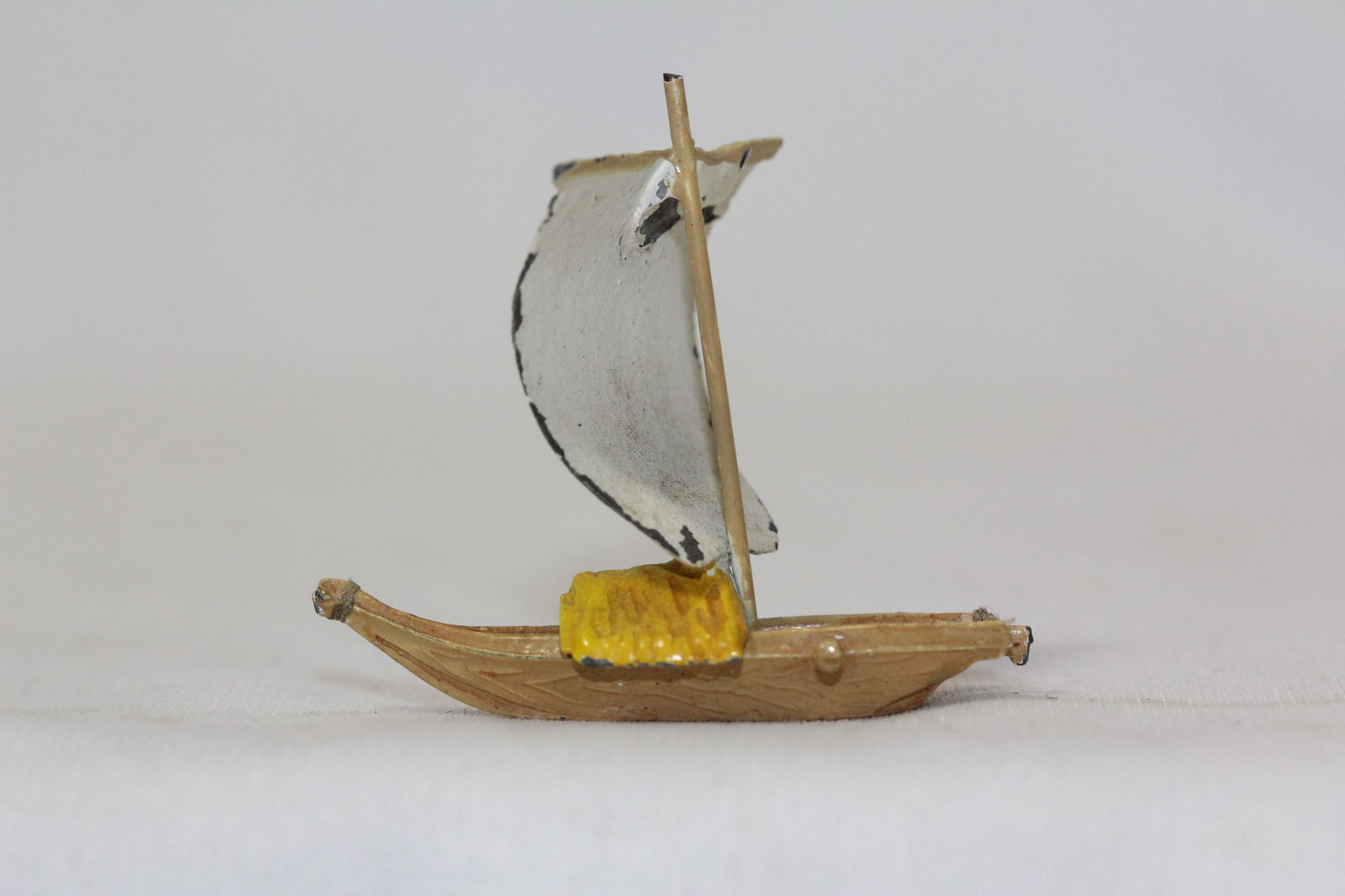 A Vintage Cast IronMiniature Long Boat: 1 3/8" tall