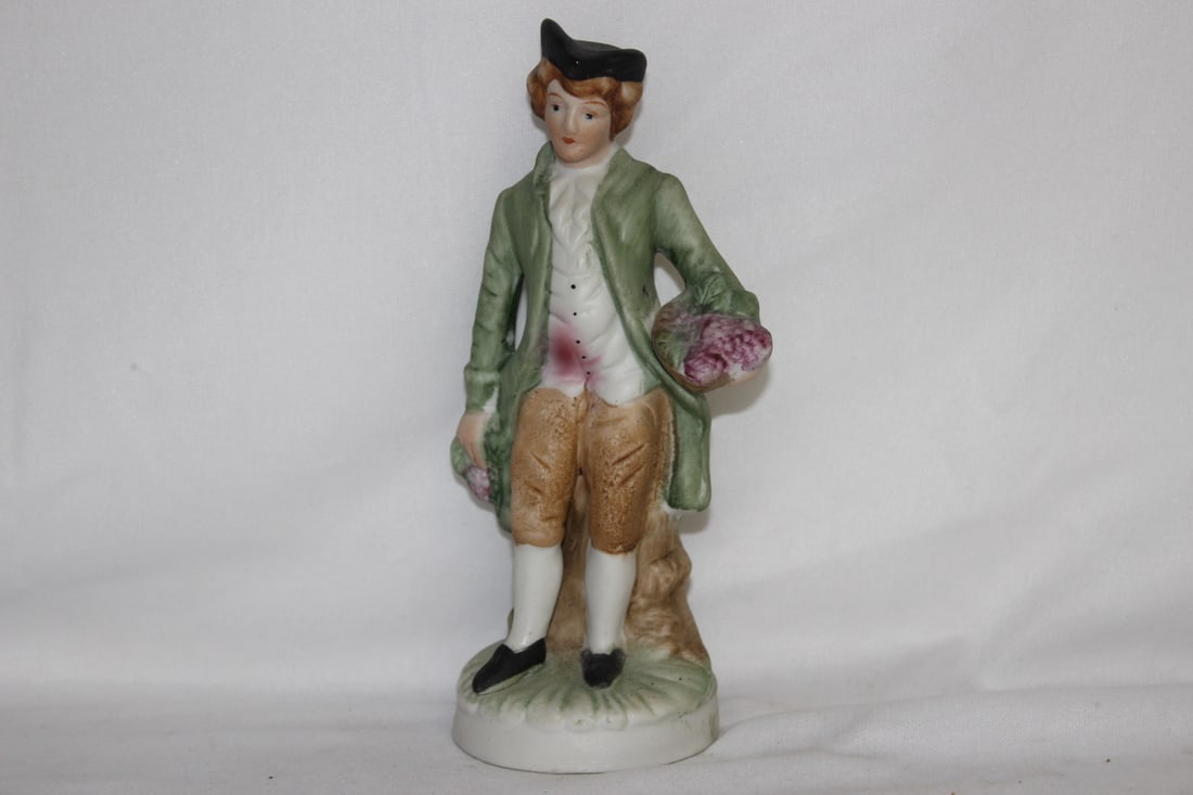 A Vintage Ceramic Figurine: 6 3/4" tall