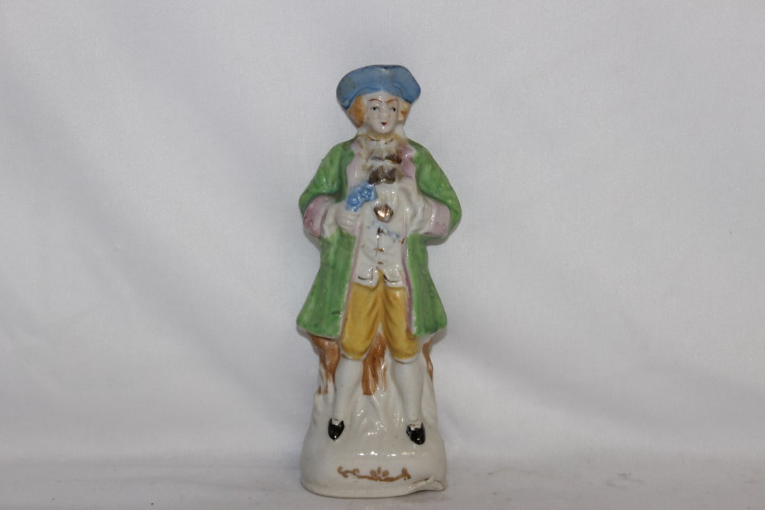 A Vintage Ceramic Figurine: 6 3/4" tall