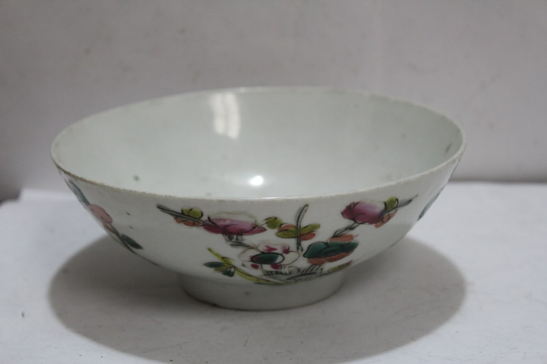 An Antique Chinese 19th Century Famille Rose Bowl: please note: some imperfection, possibly due to manufacturer's defect - 6 1/4" in diameter