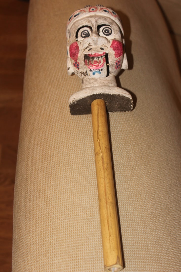 Wooden Chinese Puppet: with a bamboo stick - you pull the string and the mouth moves - may have something to do with the chinese Olympic - 15 inches tall