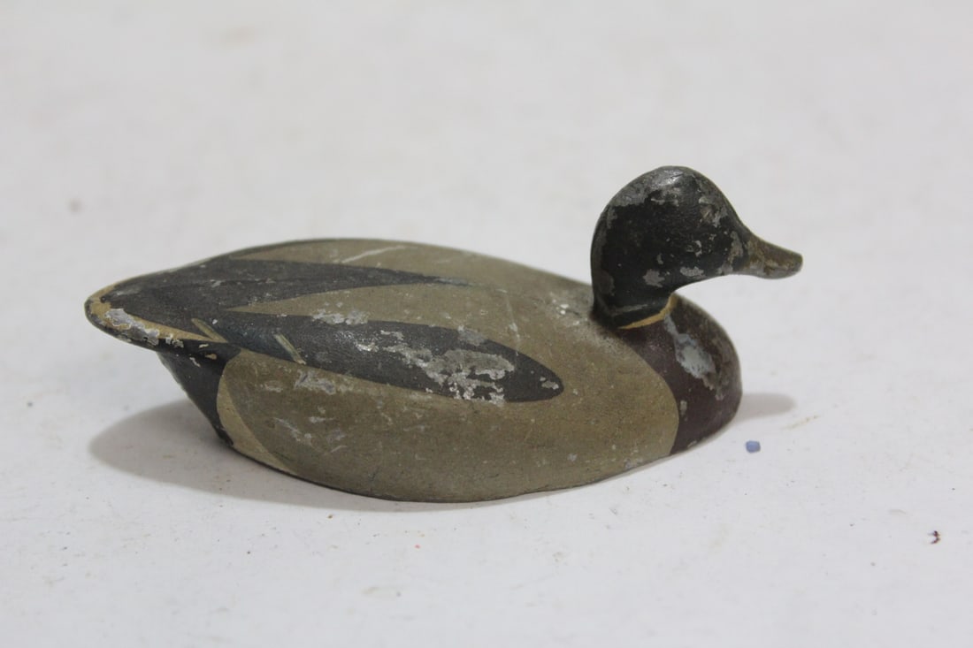 A Solid Metal/Cast iron Goose: 3 3/8" across- vintage