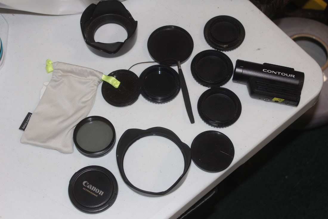 A Contour Roam 3 Camera: along with other lens or camera caps, hoods , filters etc - camera is not tested to see if works or not