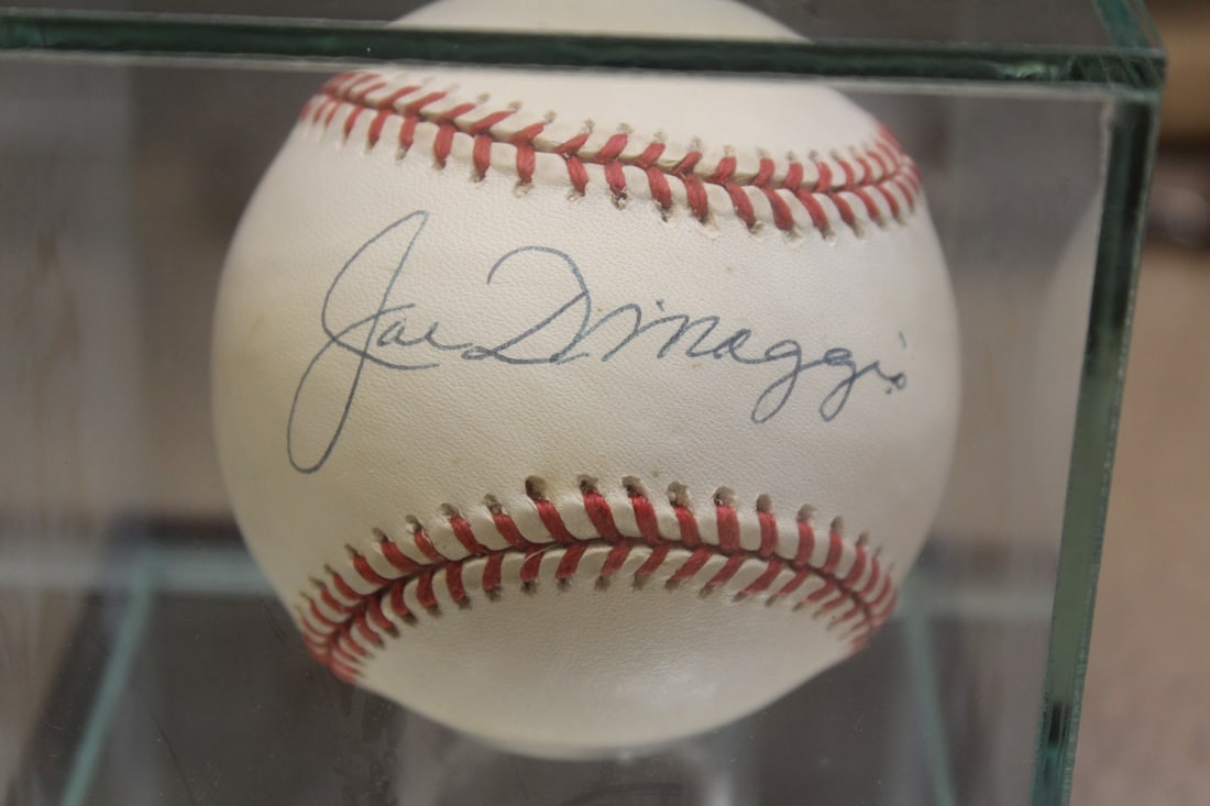 Signed baseball: Joe Dimaggio, with COA and case