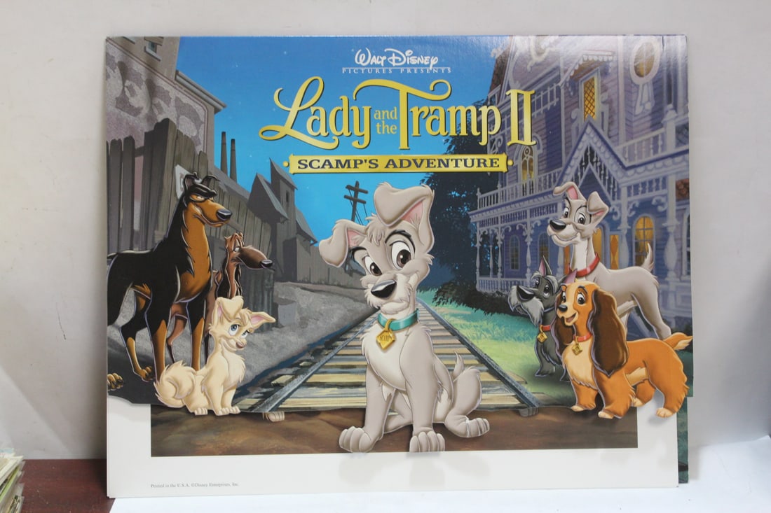Walt Disney's "Ladt and the Tramp II" Portfolio: includes 4 lithographs - 14" x11"
