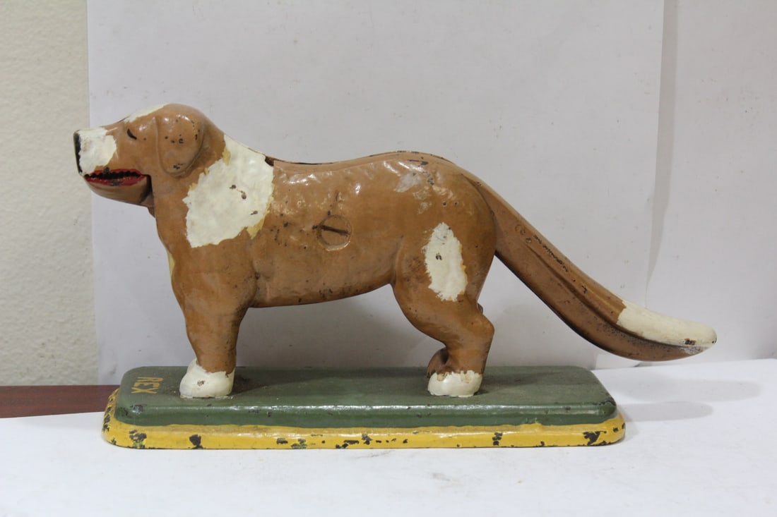 A Vintage/Antique Polychrome Dog Form Nutcracker: approximately 12 inches across