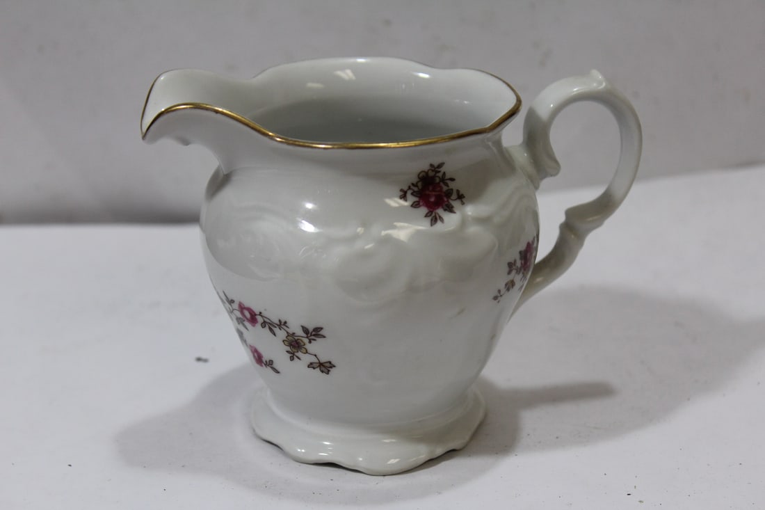 A Ceramic Creamer: 4" tall