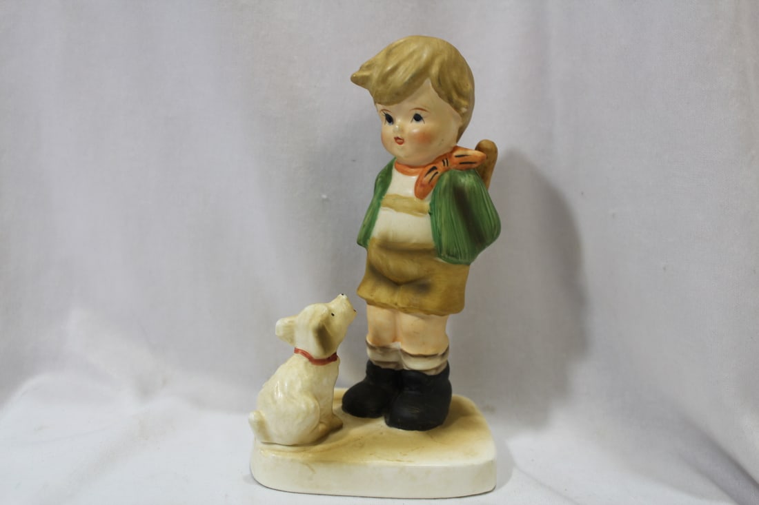 A Hummel-Style Figurine: 6 1/2" tall