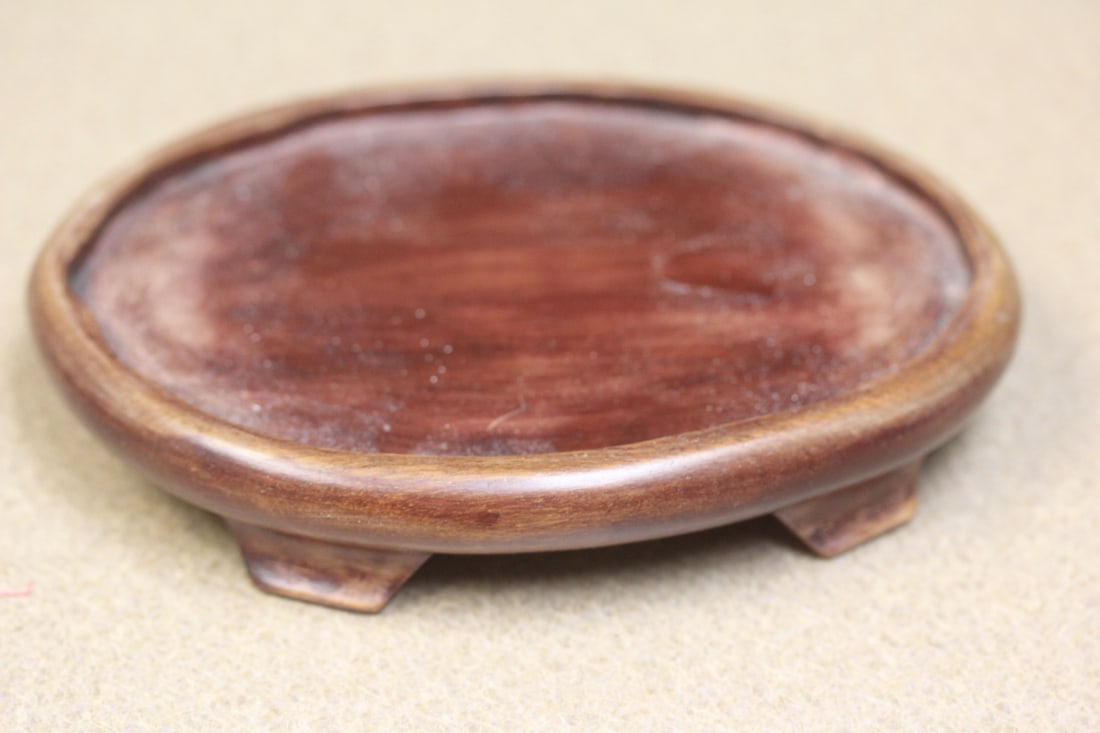 Wooden stand: well carved, 6 1/8" in diameter