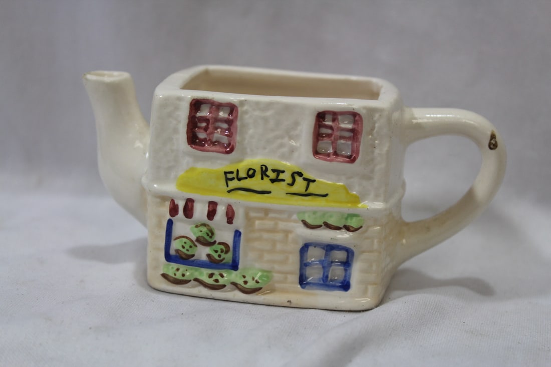 A Ceramic Planter: 5" long