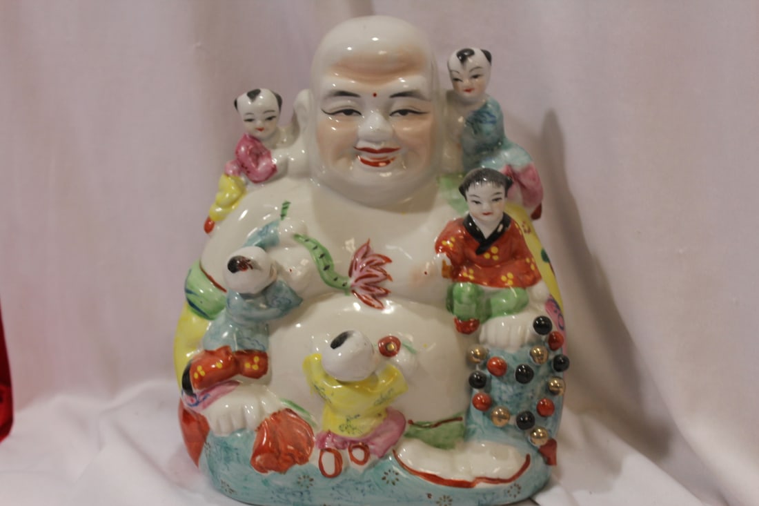 A Ceramic Chinese Buddha with Children: 8" tall