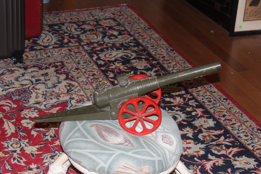Cast Iron and Metal Cannon: was told from the 1950's, but exact age unknown - do not know if works or not - 24 inches long
