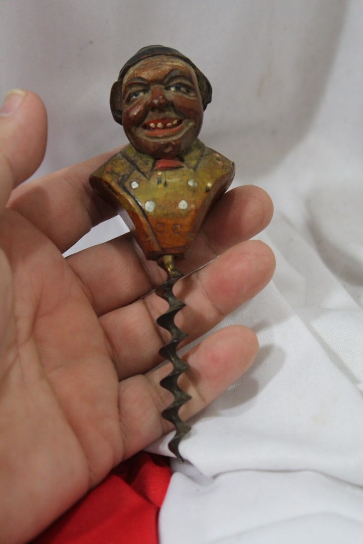 A Vintage German Wooden Figueral Cork Opener: overall= 5" tall