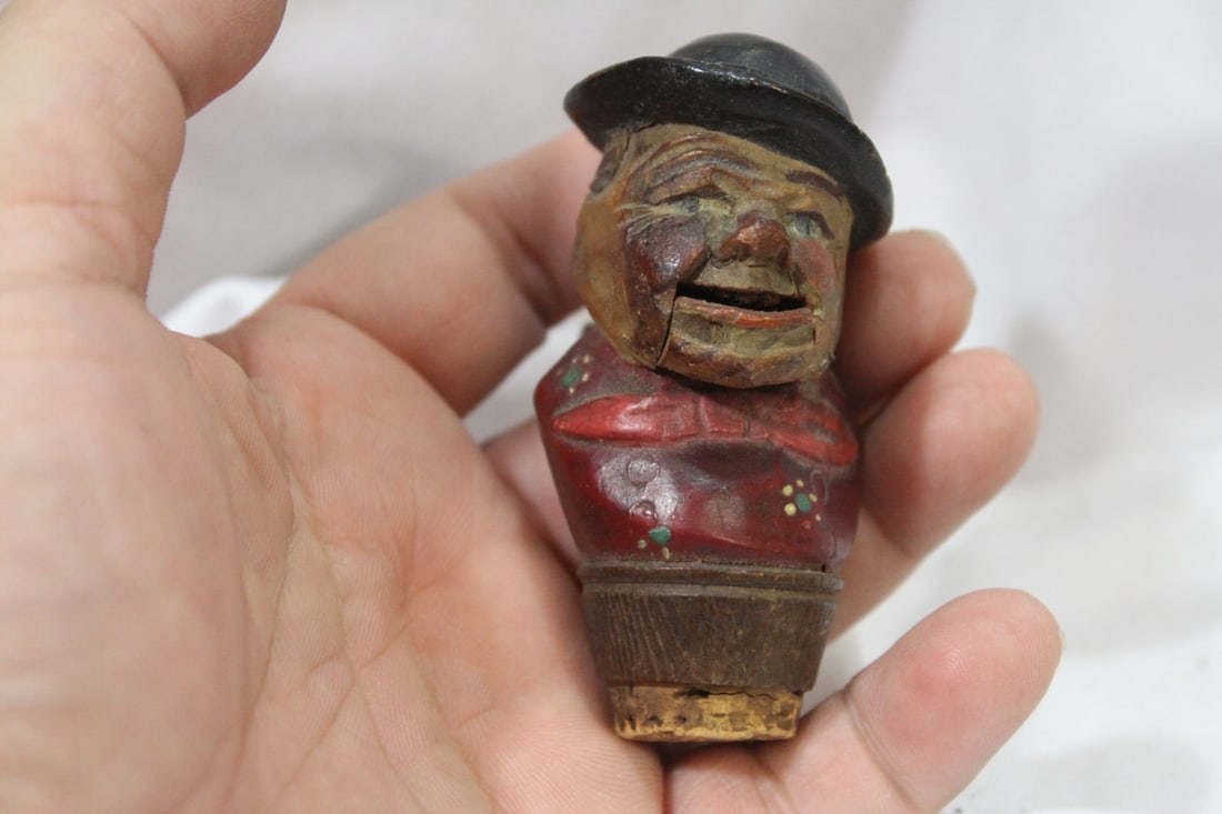 A Vintage German Wooden Figueral Cork Stopper: articulated - 2 7/8" tall