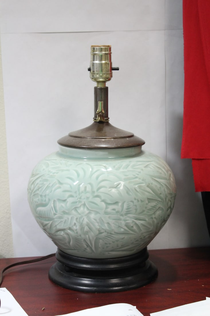 A Chinese Celadon Vase: turns into a lamp - nicely donem however age is unknown - overall= 14 1/4" tall - jar only= 6 1/2" tall x 7 3/4" wide