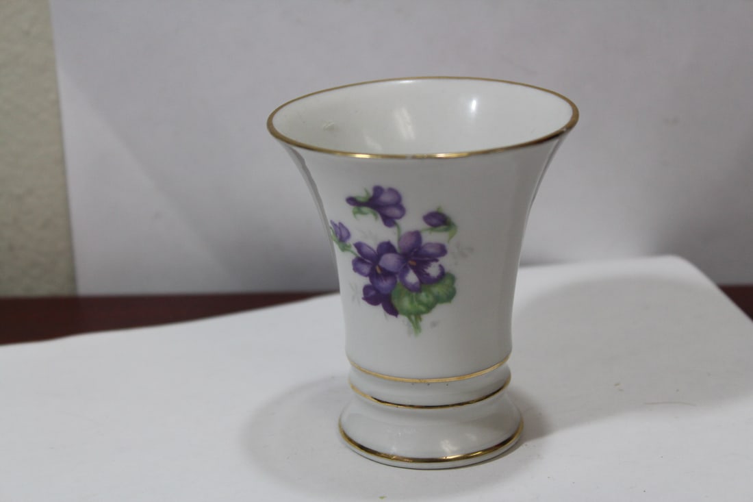 A Ceramic Cup: made in Germany - 3 1/4" tall