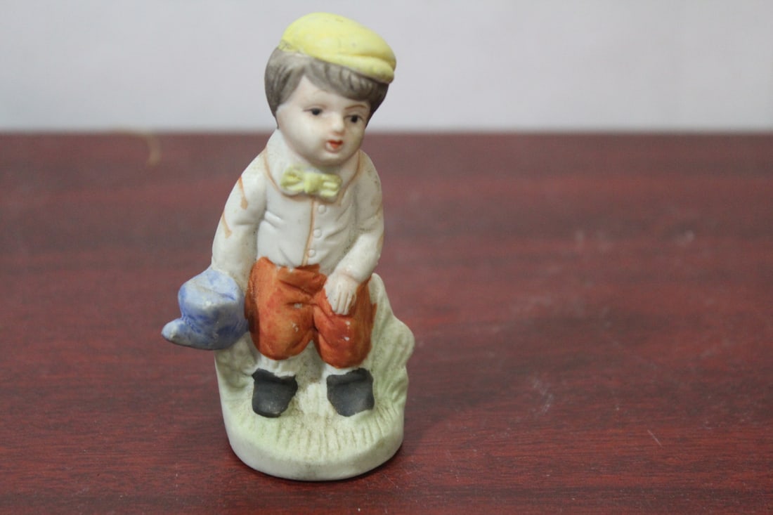A Ceramic Figurine: 3 1/2" tall