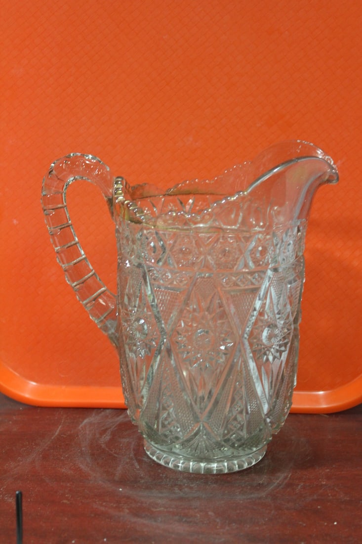 A Pressed Glass Pitcher: 8 5/8" tall