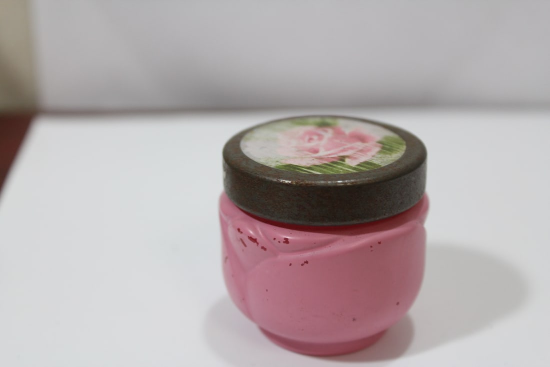 An Old Avon Glass Bottle: 1 3/4" tall