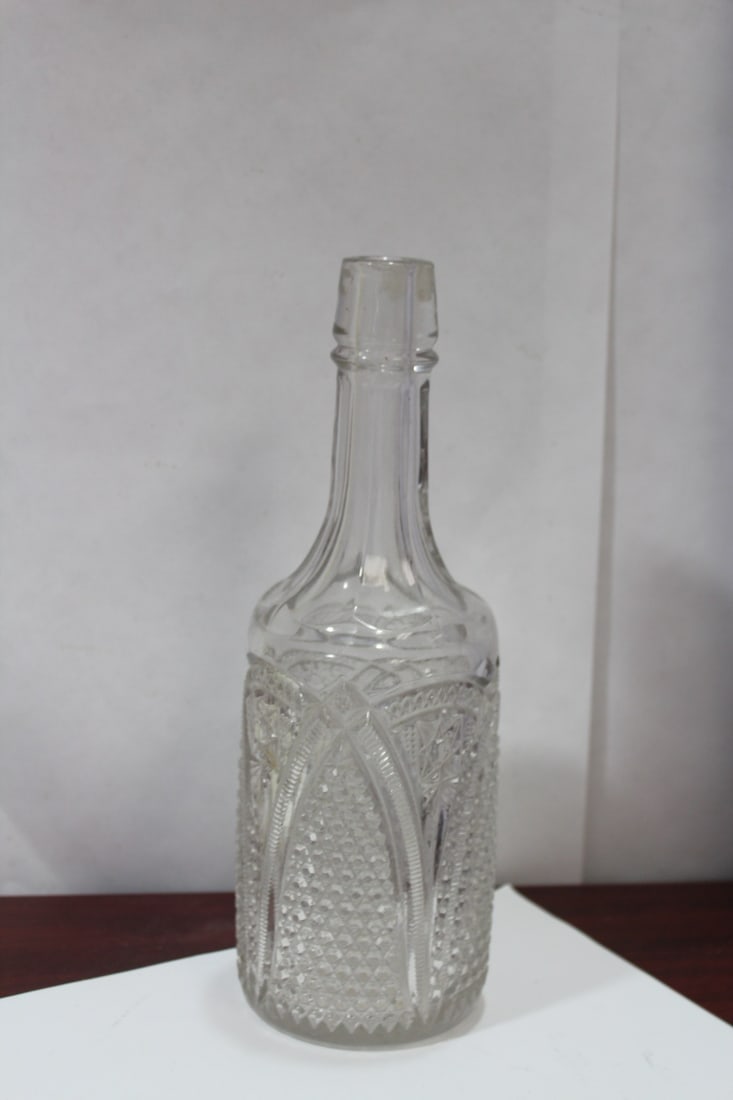 A Pressed Glass Wine Bottle: 11" tall