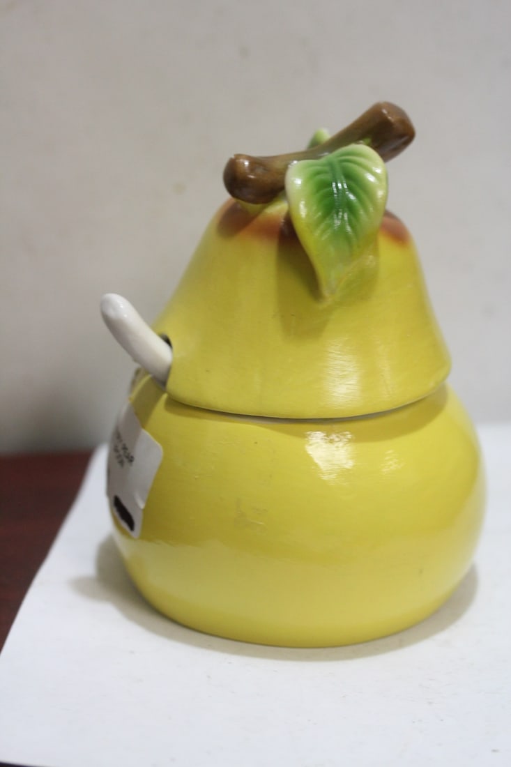 A Pear Shape Pottery Jam Jar: with spoon - 5 3/4" tall