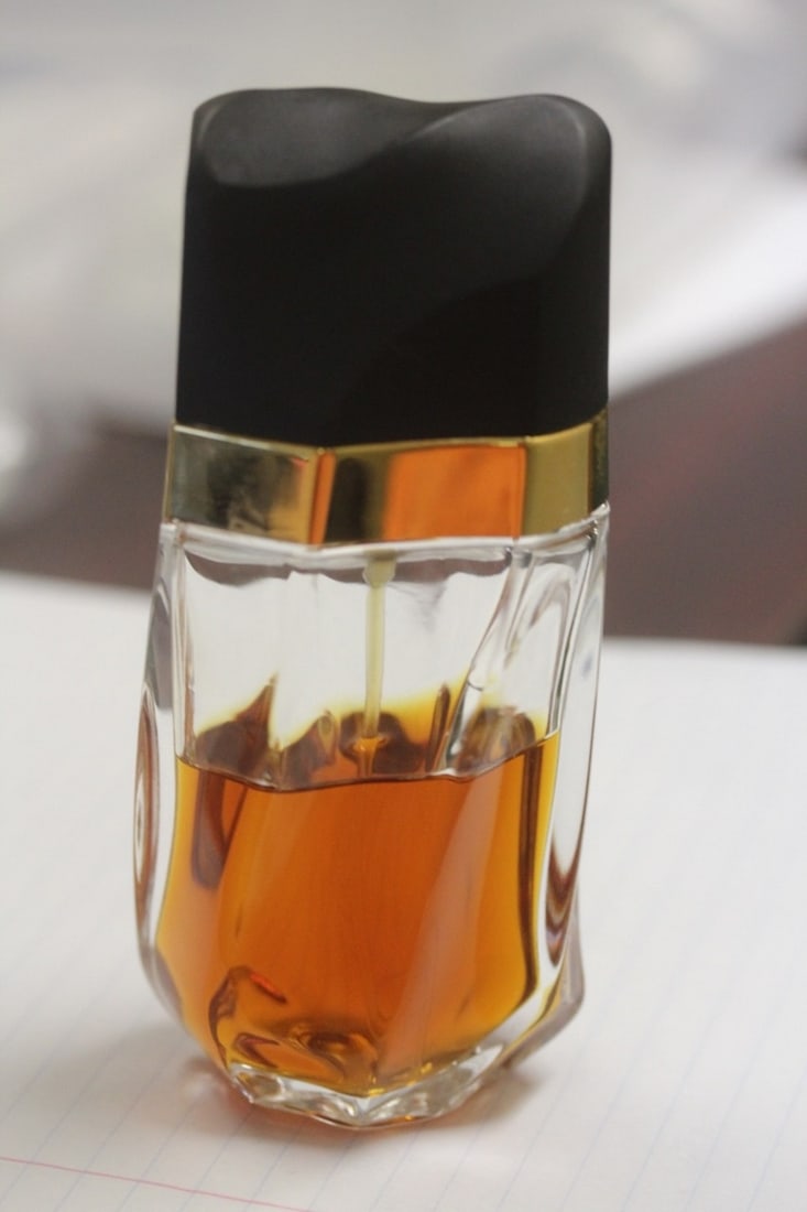 "Knowing" Parfume Bottle: with parfume in it over 1/2 full