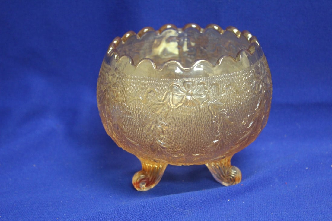 A Carnival Glass 3 Footed Bowl: 4 1/4" tall