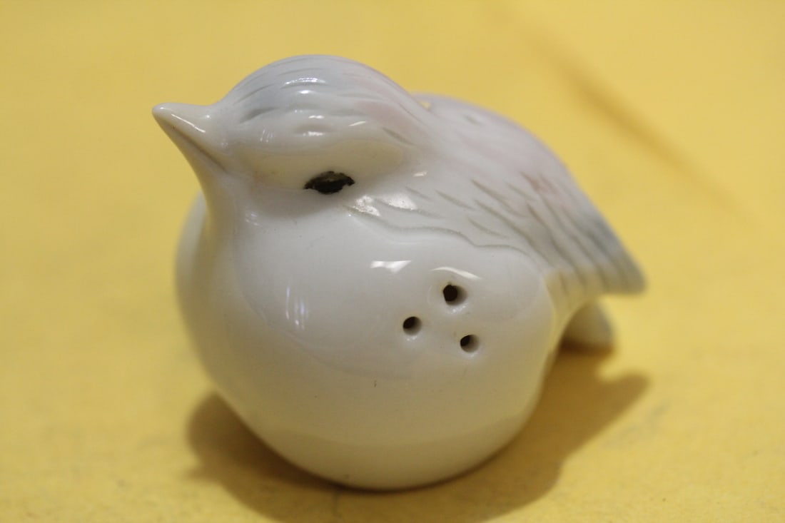 A Single Bird Form Shaker: 2 inches across