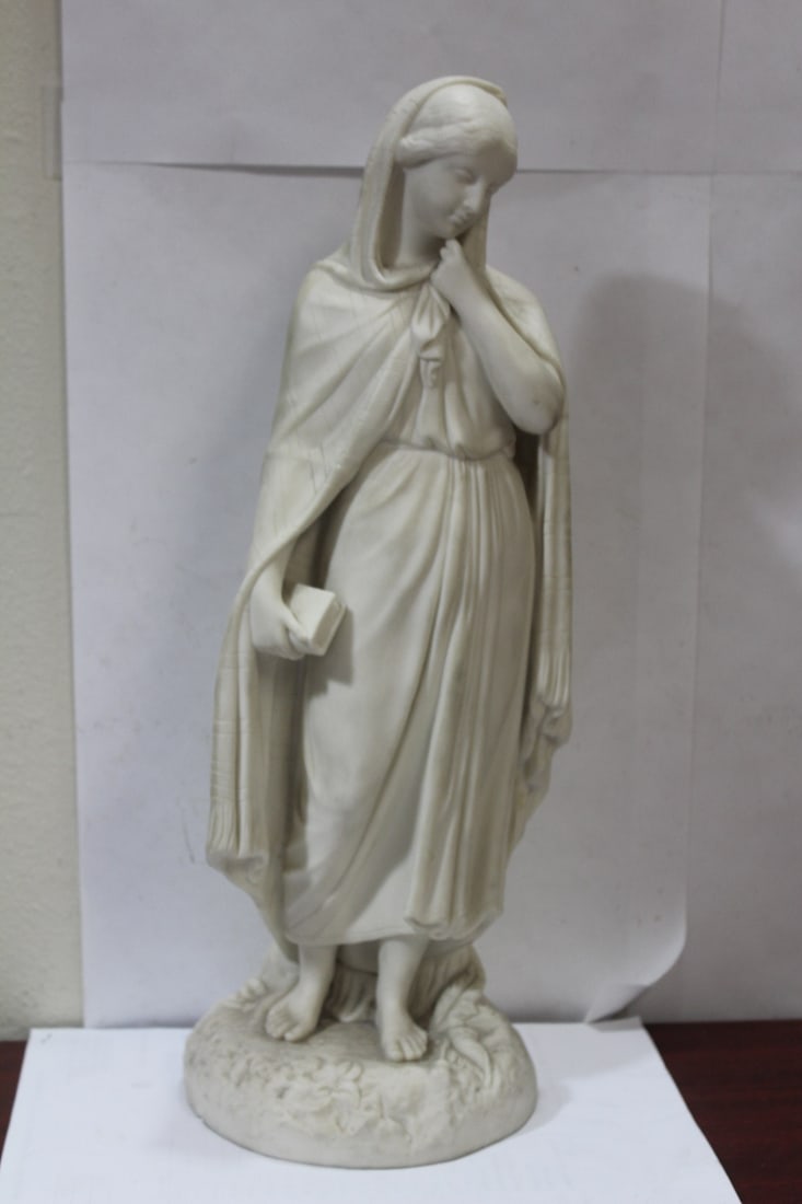 An Antique Parian Girl with Book: please note: couple of base chips - 16 1/2" tall