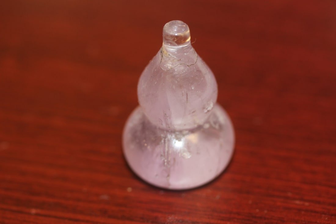 A Small Rock Guard: crystal/amethyst/quartz - 1 3/4" tall