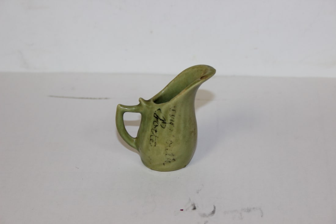 A Miniature Pottery Pitcher: 2 1/2" tall