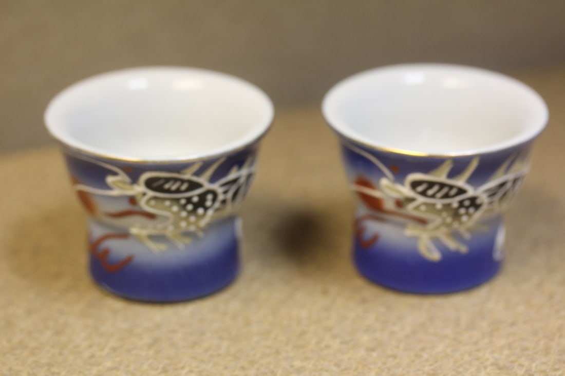 Japanese dragon saki cups: ceramic, set of 2, 2" in diameter
