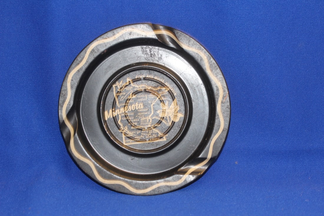 A Minnesota Souvenir Metal Ashtray: as shown