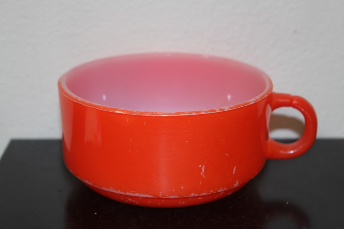 A Glassbake Orange Soup Bowl: please note= one small fleabit as shown, possibly a manufacturer's flaw - 4 3/4" in diameter